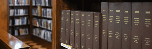 brown library books on a shelf