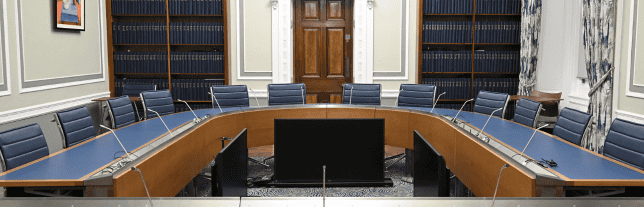 blue seats around a wooden table